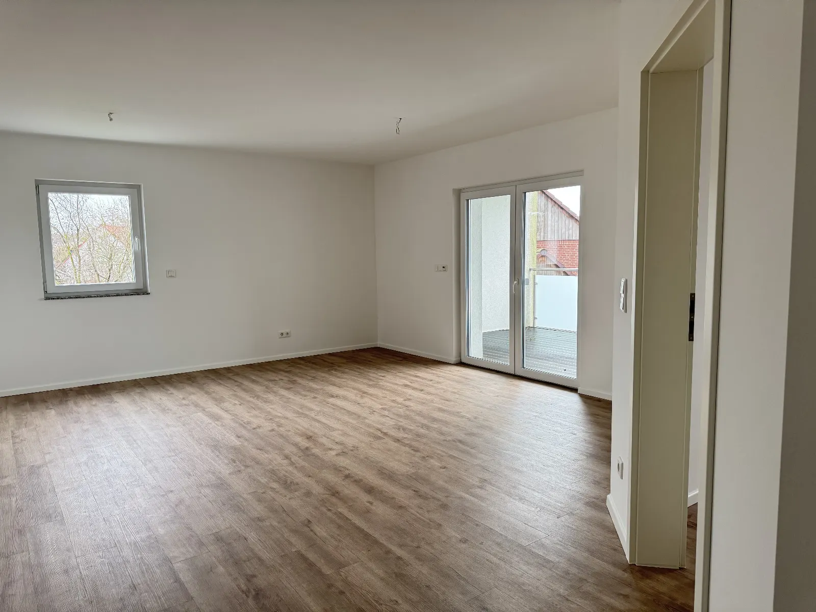 Modernes Mehrfamilienhaus mit hochwertiger Ausstattung und Top-Lage im Grünen – Bild 4