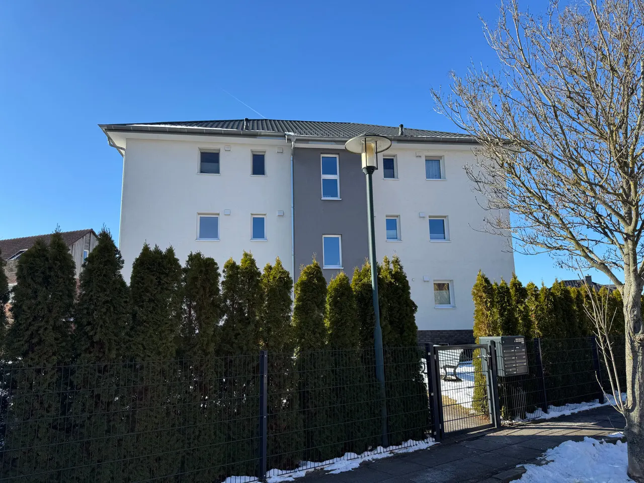 Modernes Mehrfamilienhaus mit hochwertiger Ausstattung und Top-Lage im Grünen – Bild 5